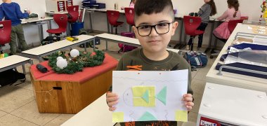 Math Boy shows his picture
