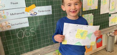 Math A boy shows his picture