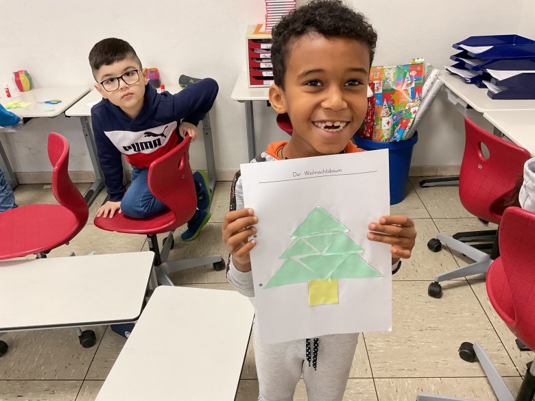 Wiskunde Een jongen toont zijn foto